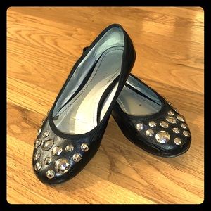 Black studded flats